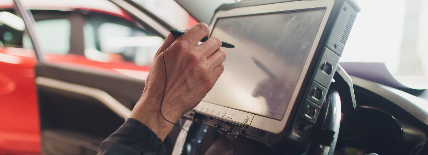 Mechanic doing diagnostic testing on a vehicle - Car Diagnostics Abernethy, Perth
